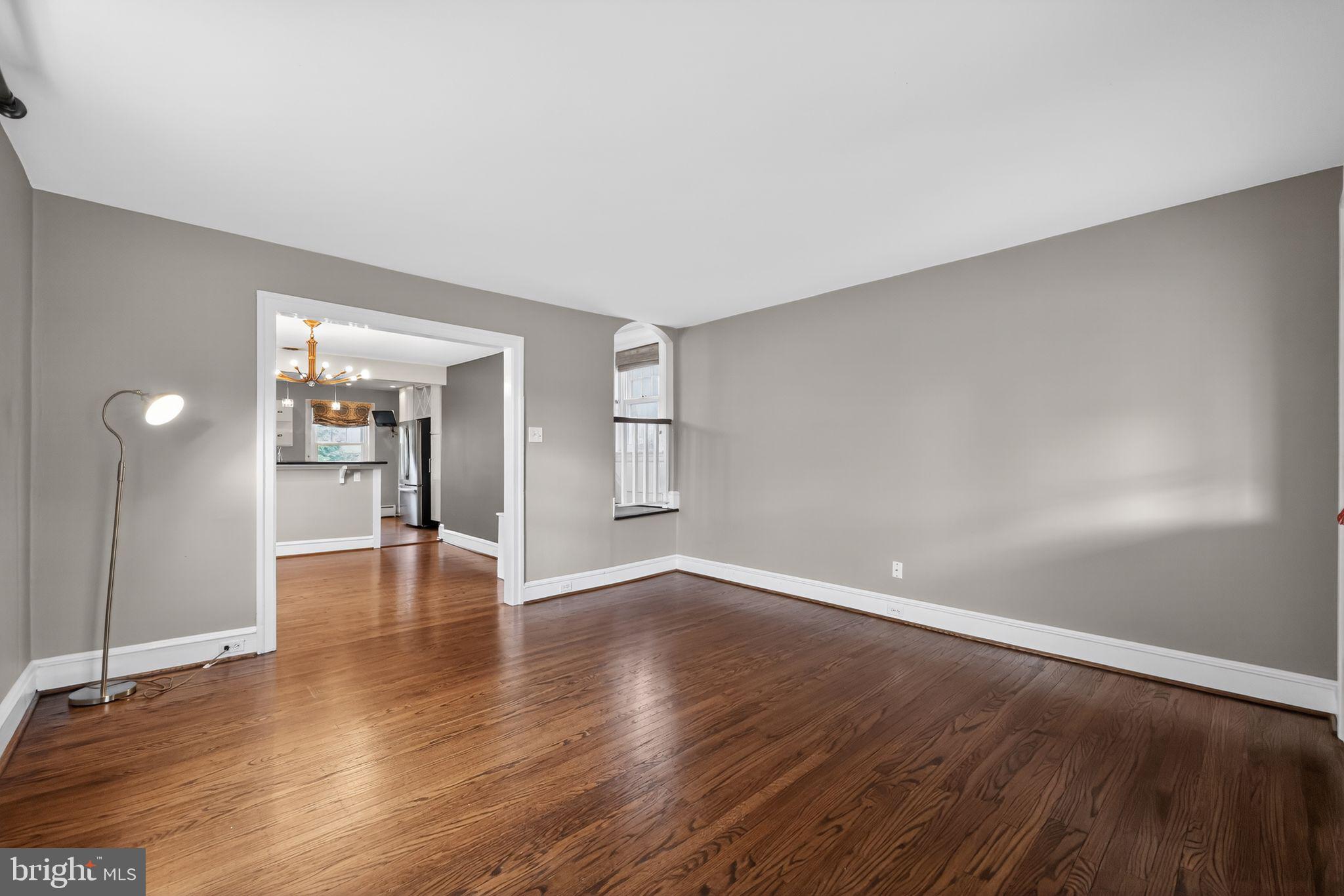 522 Dudley Avenue Narberth, PA 19072 - Photo 11 of 40 a view of an empty room with wooden floor and a window