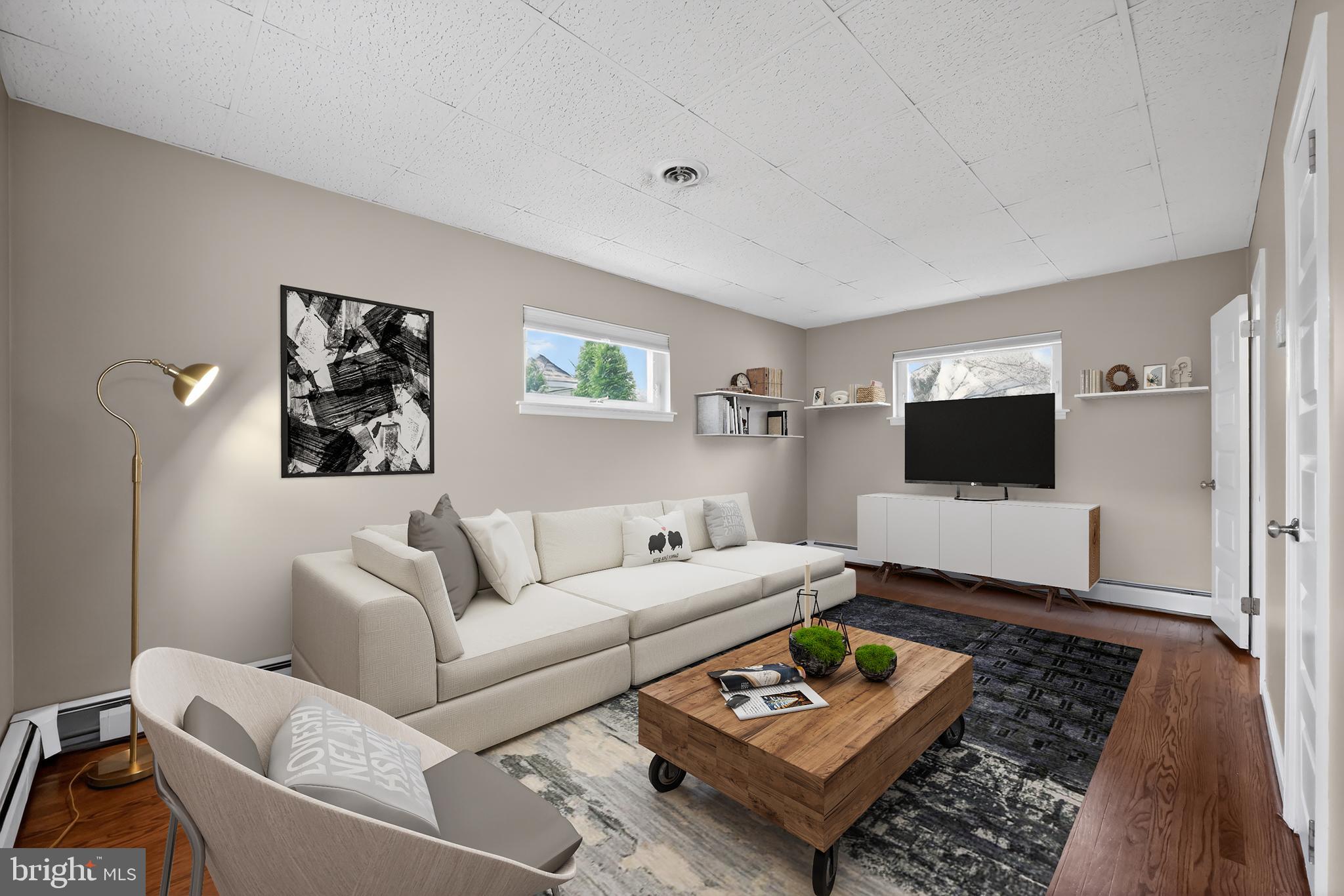 522 Dudley Avenue Narberth, PA 19072 - Photo 15 of 40 a living room with furniture and a flat screen tv