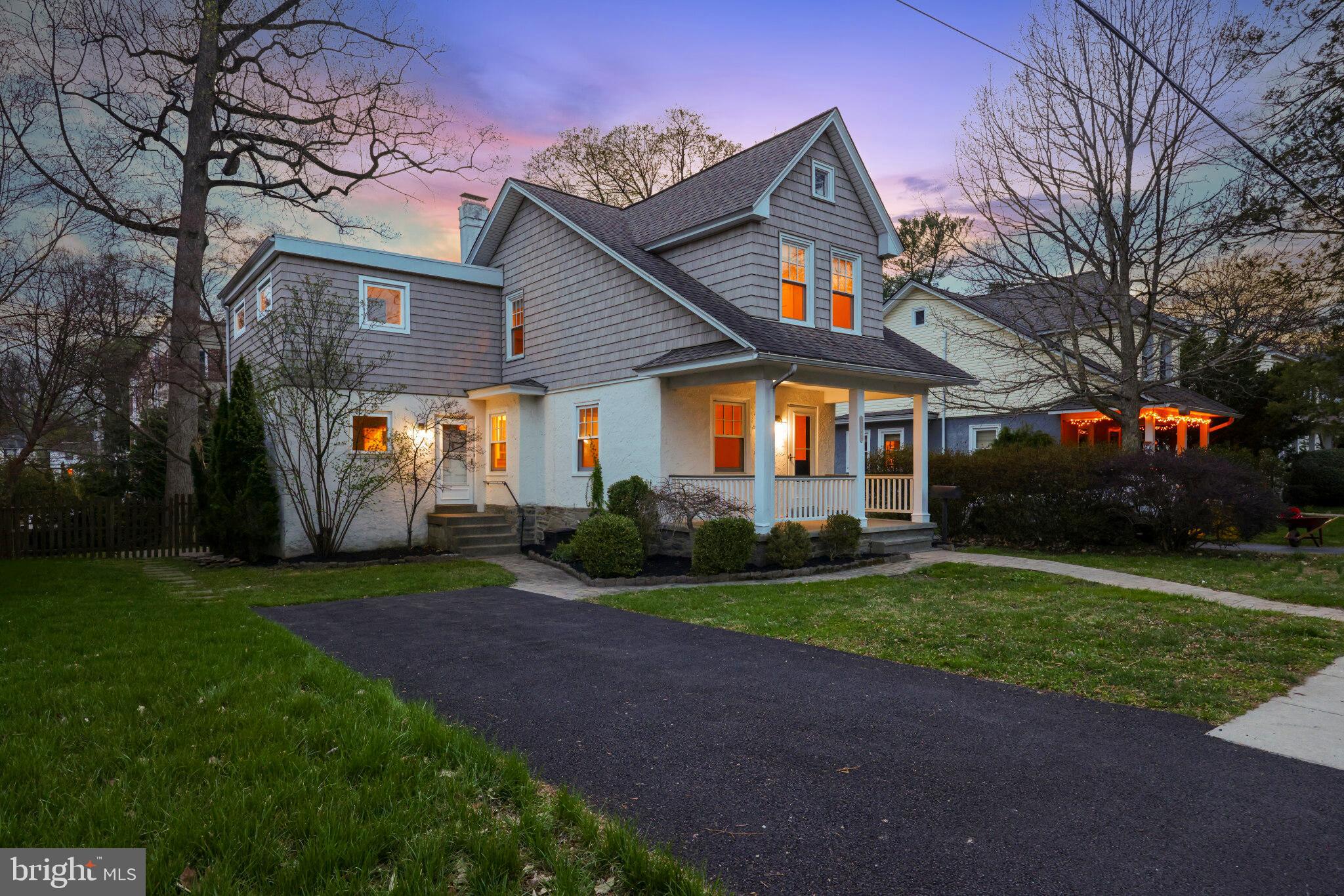 522 Dudley Avenue Narberth, PA 19072 - Photo 37 of 40 a front view of a house with a yard and garage