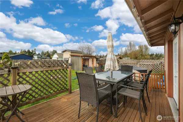 a view of a balcony with furniture