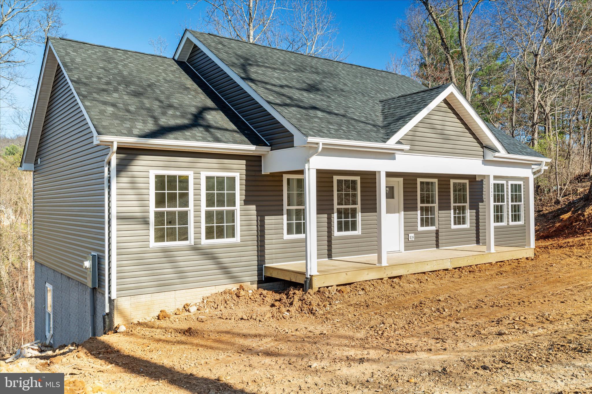 a house with yard in front of it