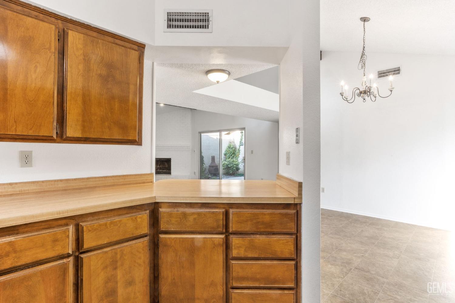 Undisclosed Address Bakersfield, CA 93309 - Photo 12 of 33 a bathroom with a sink and a mirror
