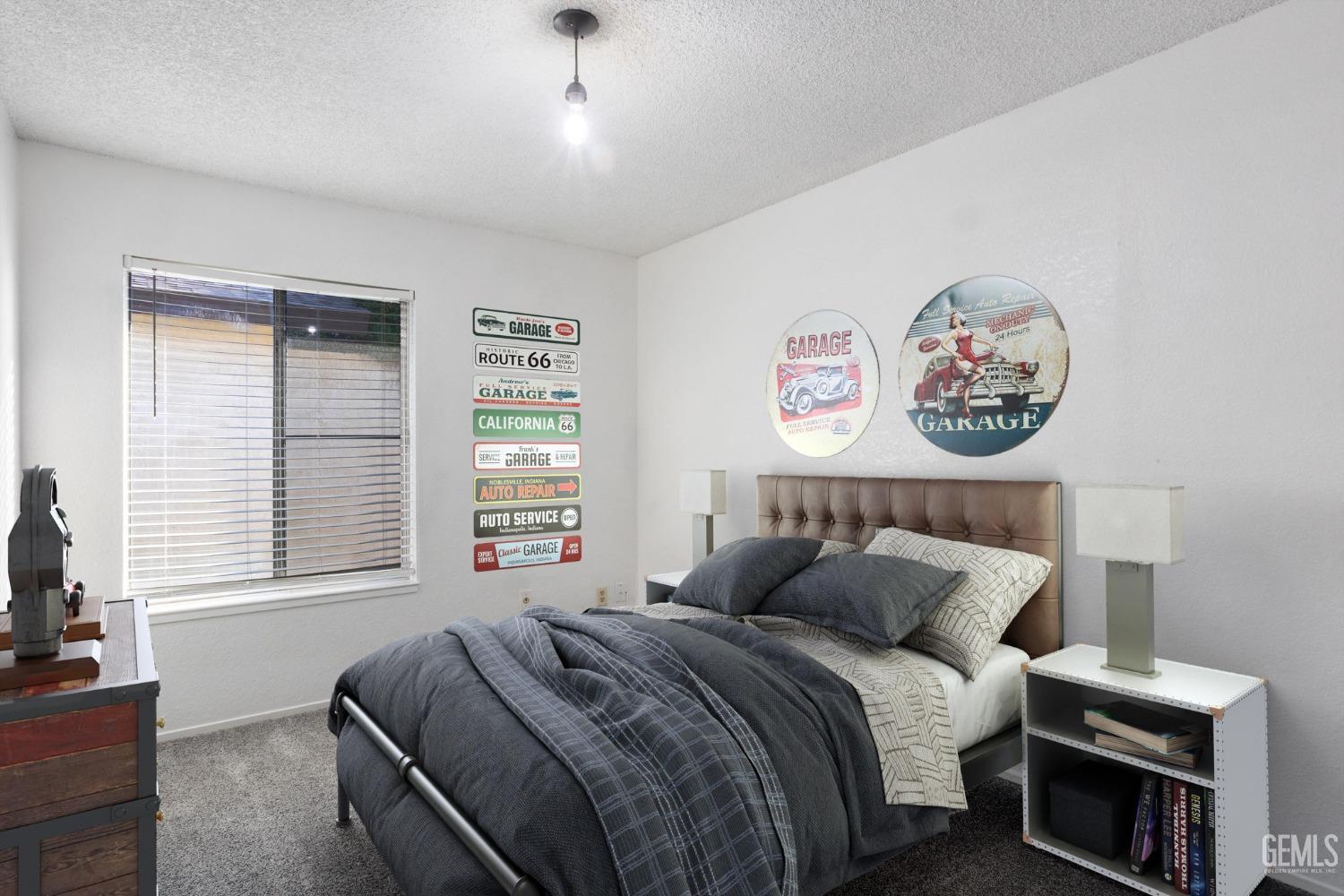 Undisclosed Address Bakersfield, CA 93309 - Photo 26 of 33 a bedroom with a bed and a window