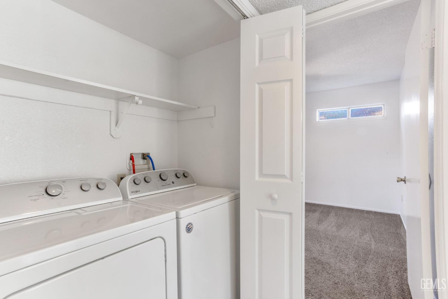 Undisclosed Address Bakersfield, CA 93309 - Photo 27 of 33 a utility room with dryer and washer