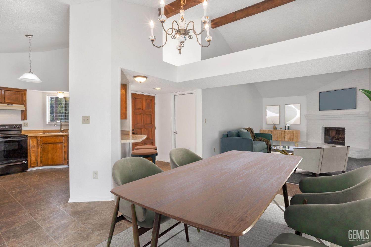 Undisclosed Address Bakersfield, CA 93309 - Photo 6 of 33 a view of a dining room with furniture and wooden floor