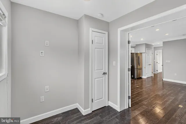 a view of entryway with wooden floor