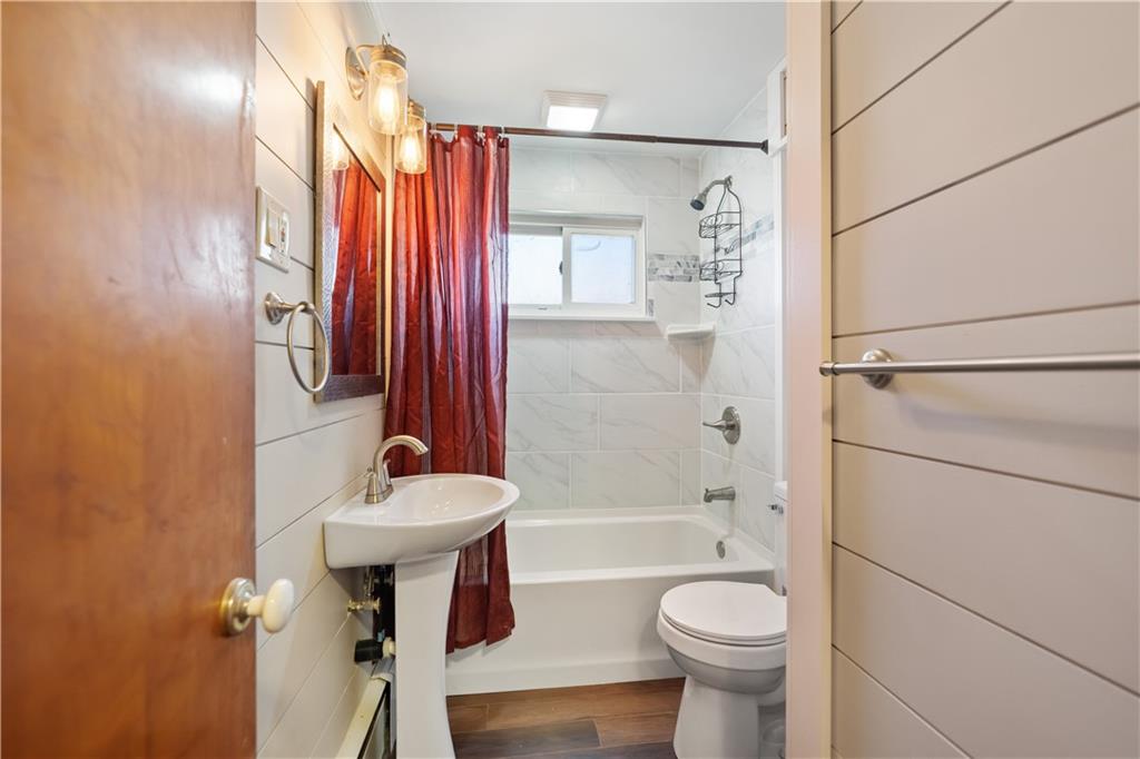 605 Duss Avenue Rochester, PA 15074 - Photo 10 of 25 a bathroom with a sink toilet and shower