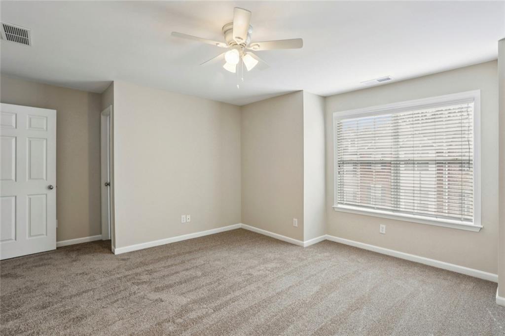 642 Bernay Way Atlanta, GA 30350 - Photo 16 of 20 a view of an empty room with a window
