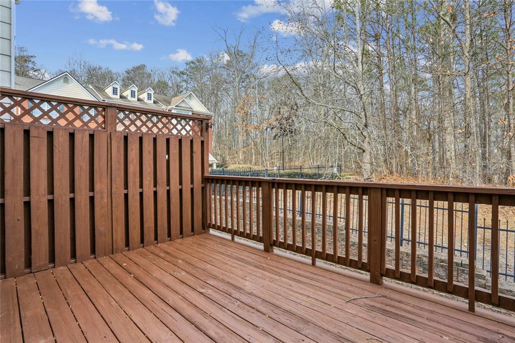 642 Bernay Way Atlanta, GA 30350 - Photo 9 of 20 a view of wooden balcony