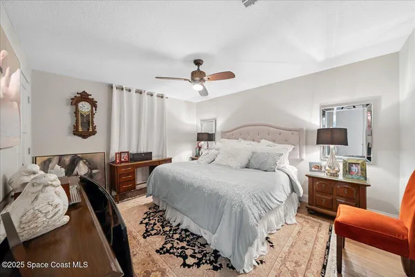 a bedroom with a bed and furniture