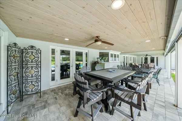 a view of a swimming pool and a yard