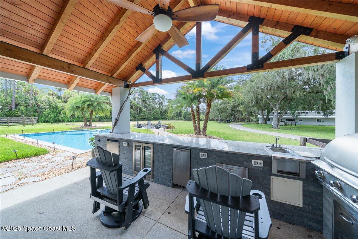 5685 Lake Washington Road Melbourne, FL 32934 - Photo 32 of 62 a view of outdoor space with seating