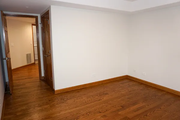 a view of a balcony with a floor to ceiling window