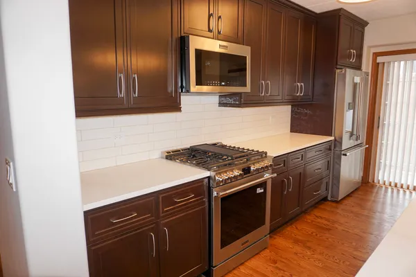 a kitchen with a sink and cabinets