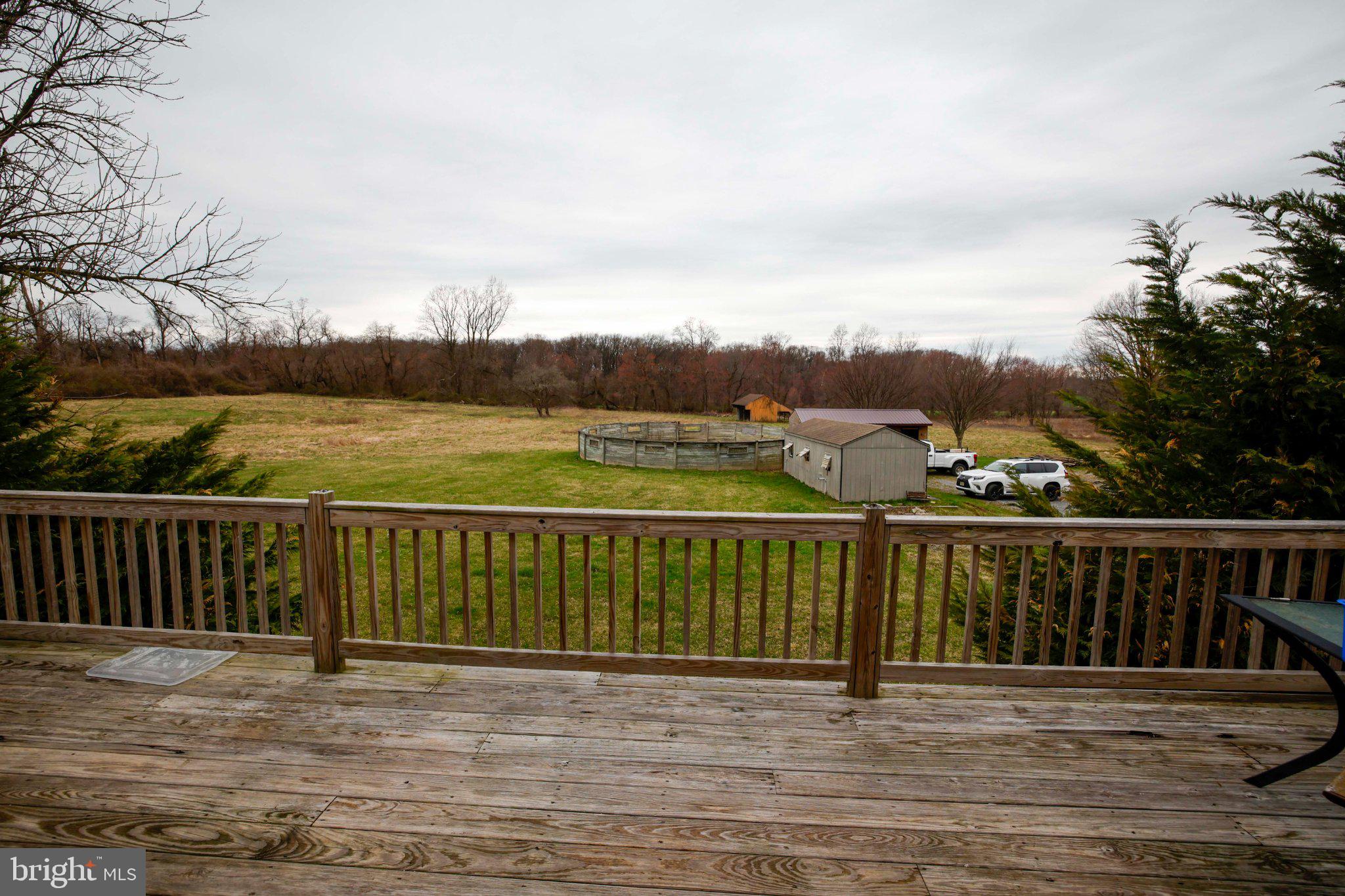 25 Keller Road Cochranville, PA 19330 - Photo 20 of 58 a view of a balcony with wooden floor and fence