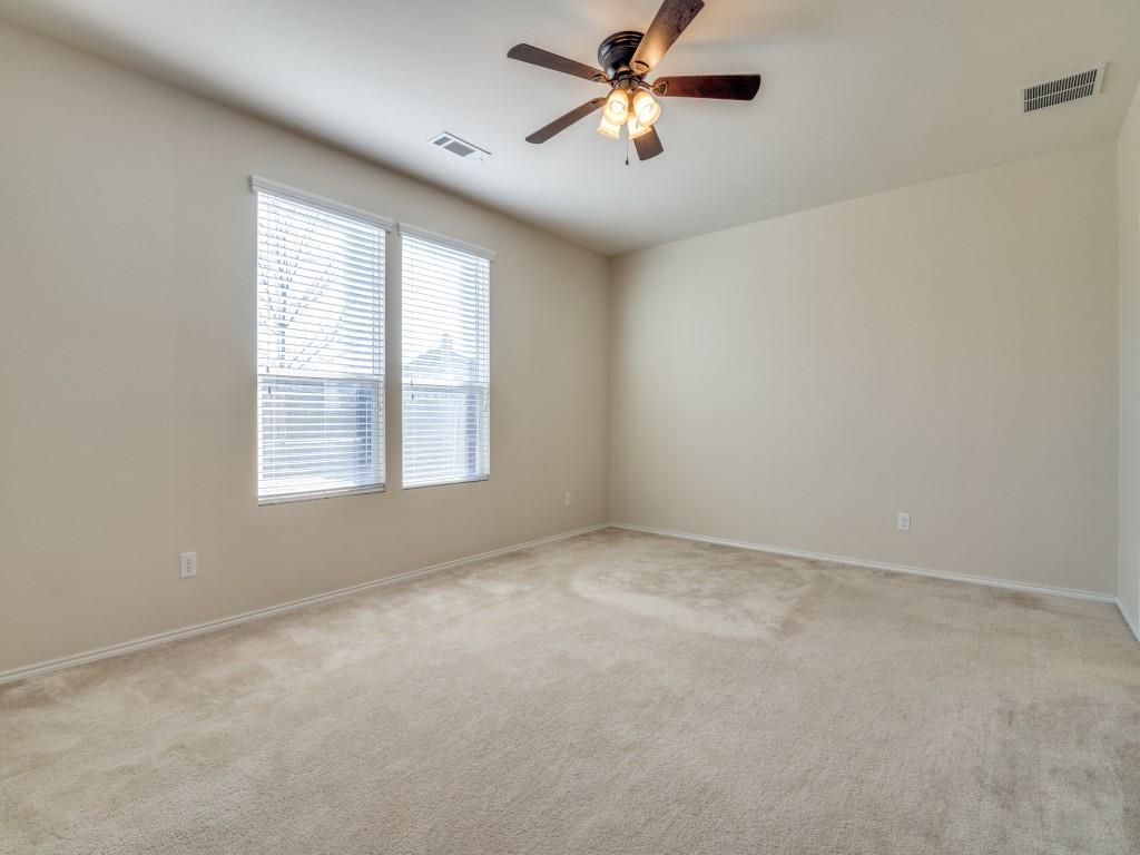 2232 Heaton Street Forney, TX 75126 - Photo 17 of 34 en empty room with windows and ceiling fan