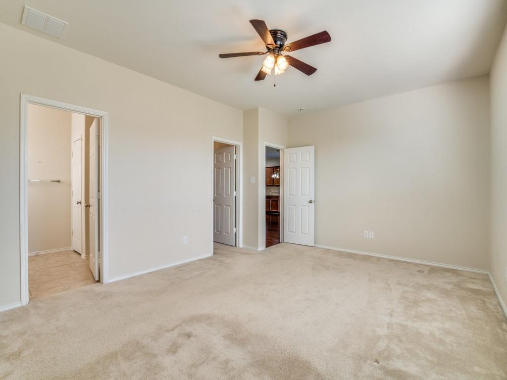 2232 Heaton Street Forney, TX 75126 - Photo 18 of 34 a view of an empty room with a ceiling fan