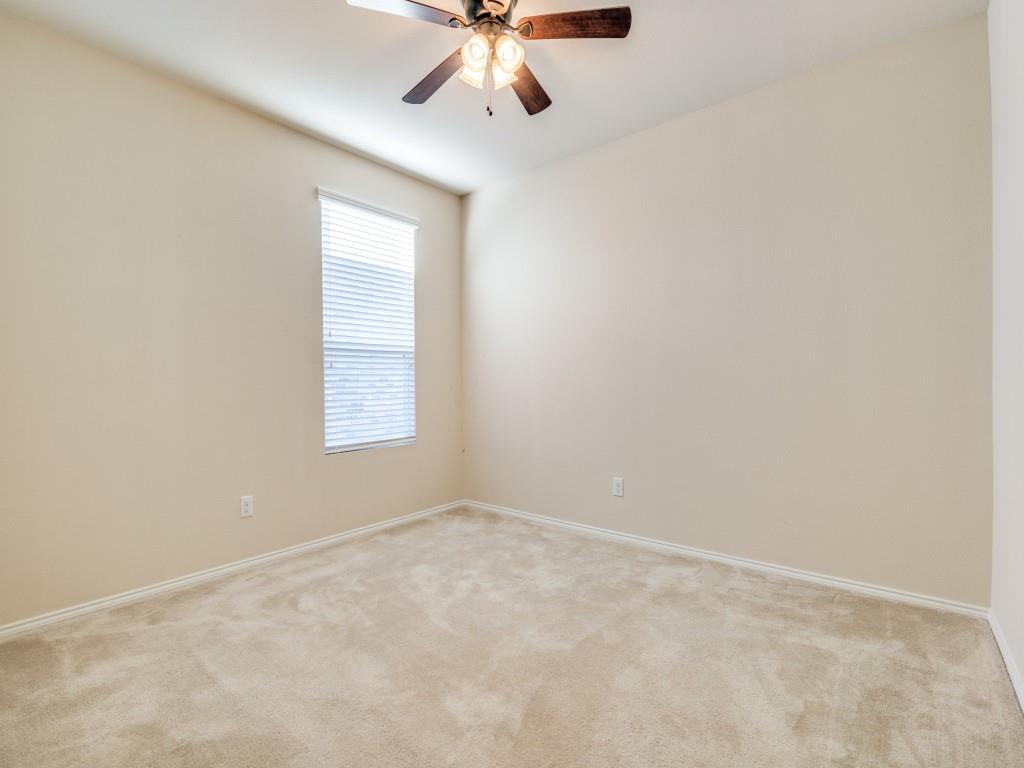 2232 Heaton Street Forney, TX 75126 - Photo 23 of 34 an empty room with windows and fan