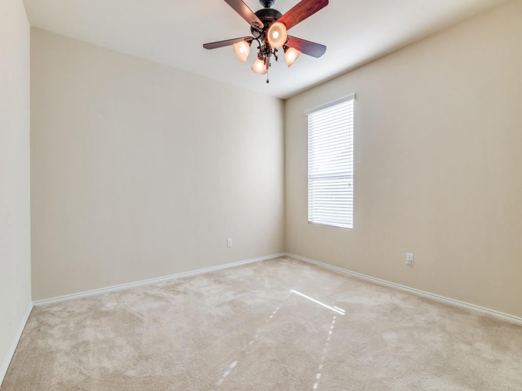 2232 Heaton Street Forney, TX 75126 - Photo 27 of 34 an empty room with windows and fan