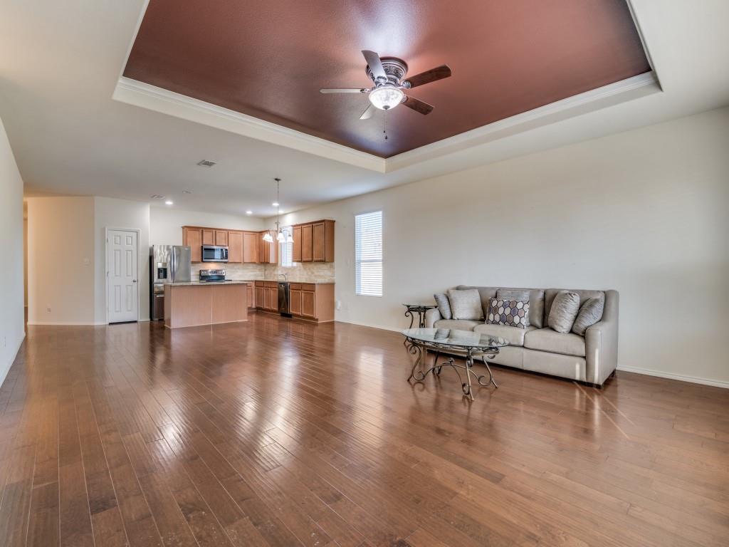 2232 Heaton Street Forney, TX 75126 - Photo 9 of 34 a living room with furniture and wooden floor