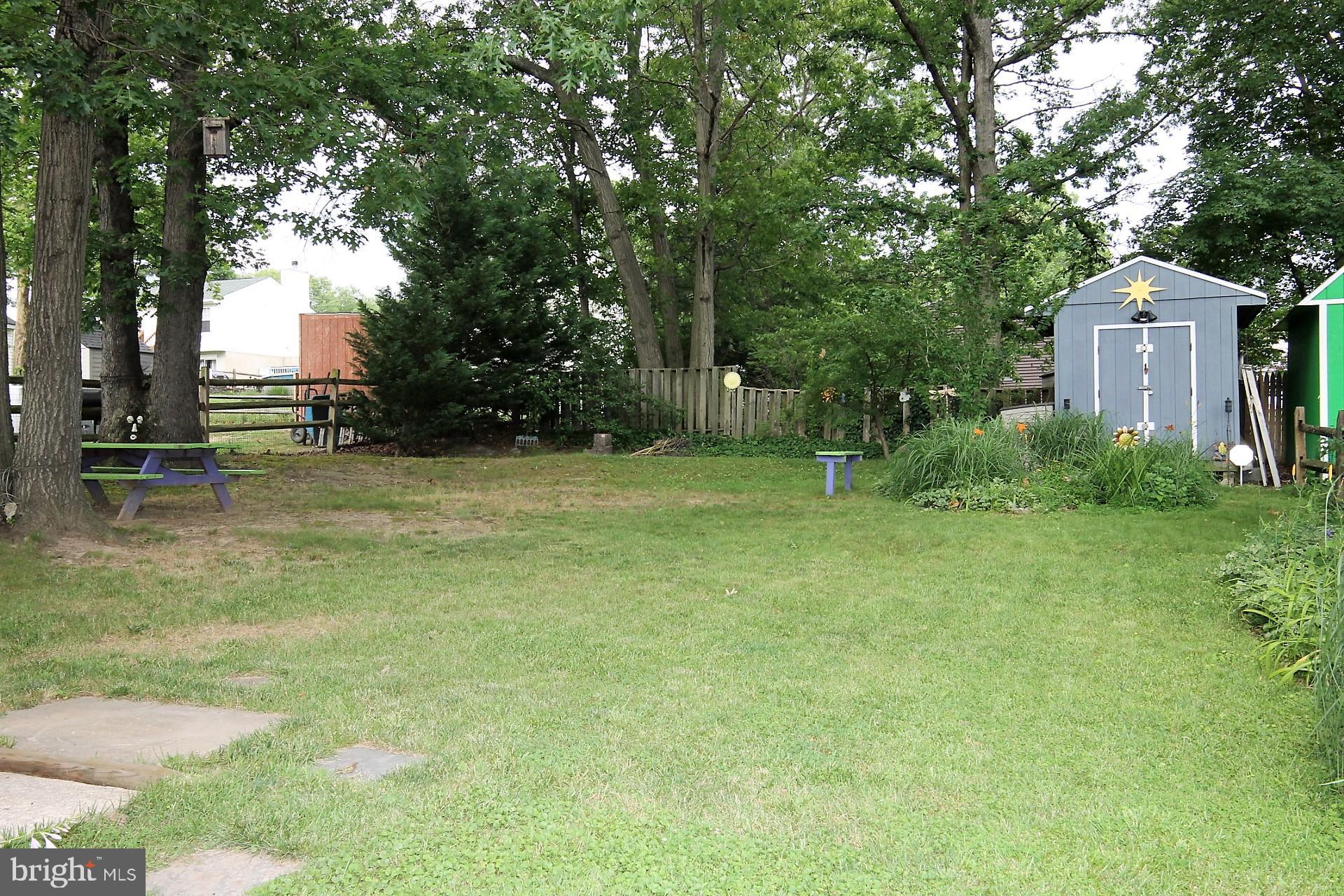 1921 Grant Road Halethorpe, MD 21227 - Photo 27 of 30 Large backyard with pond