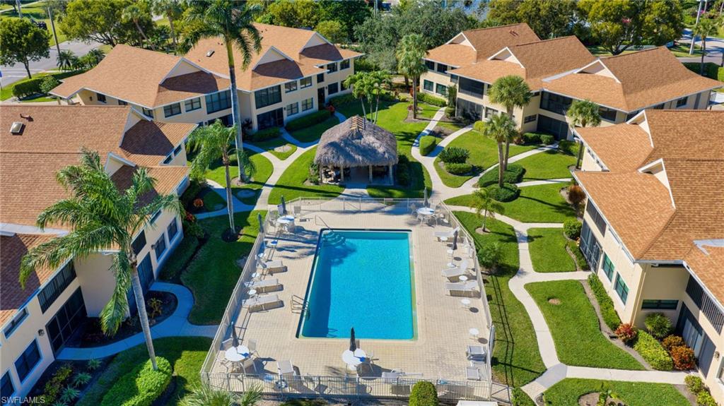 1100 9th Street South, Unit D201 Naples, FL 34102 - Photo 17 of 25 an aerial view of a house