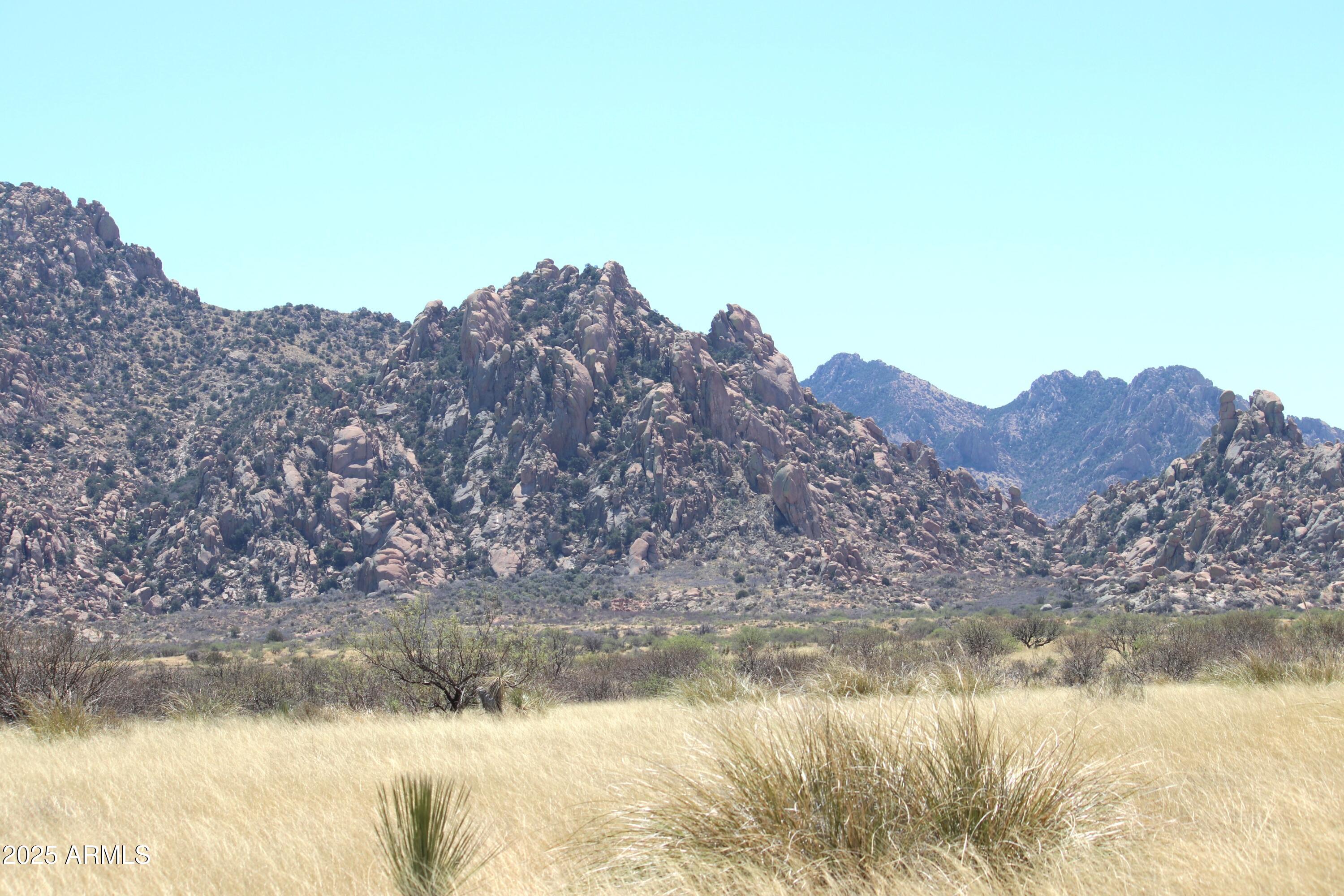 M44 East Horse Ranch Road, Unit 44 St. David, AZ 85630 - Photo 2 of 13 a view of lake with mountain in the background