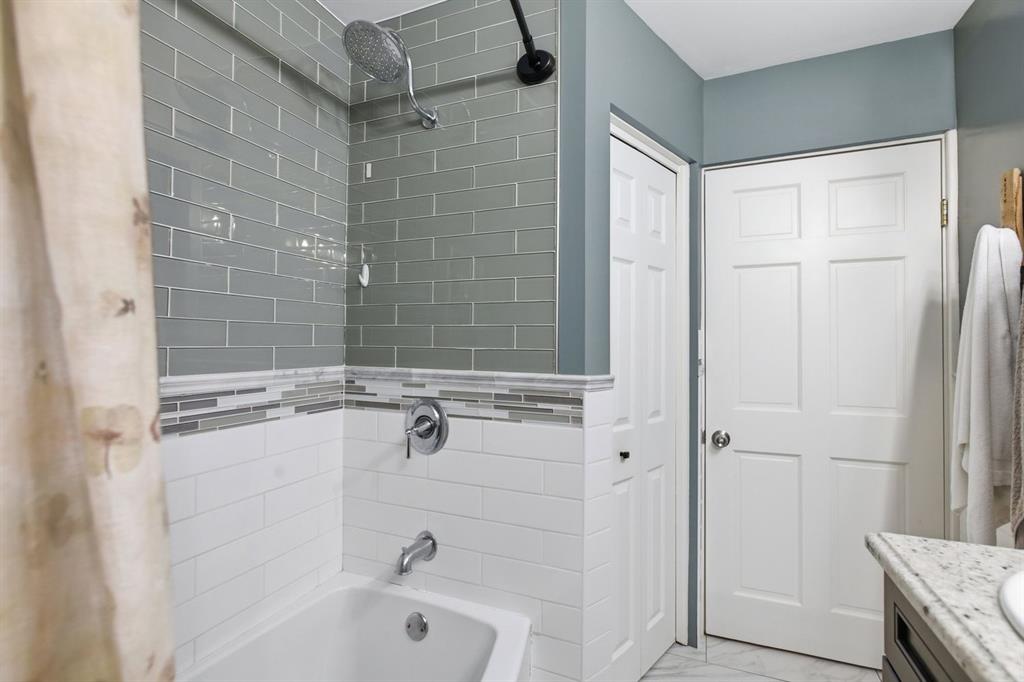 5275 Tuscarawas Road Beaver, PA 15009 - Photo 32 of 47 a bathroom with a bathtub and a shower