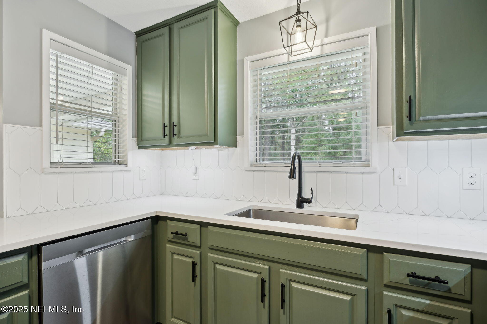 13193 Caldwell Road Jacksonville, FL 32226 - Photo 18 of 50 a kitchen with a sink and a window