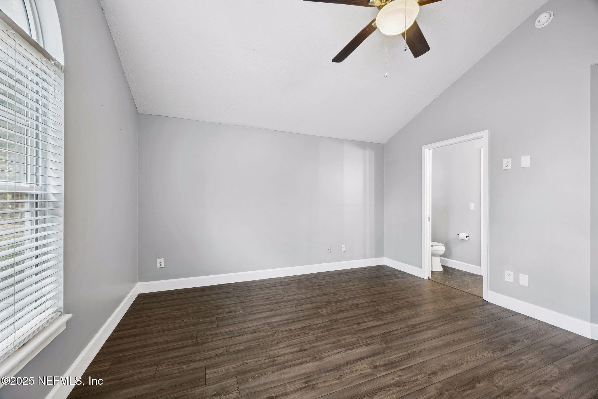 13193 Caldwell Road Jacksonville, FL 32226 - Photo 28 of 50 wooden floor in an empty room with a window