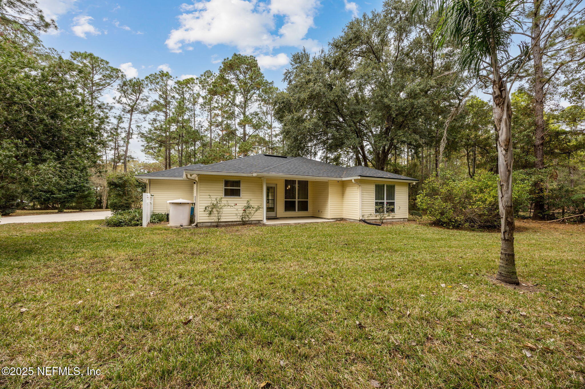 13193 Caldwell Road Jacksonville, FL 32226 - Photo 36 of 50 a front view of house with yard and trees