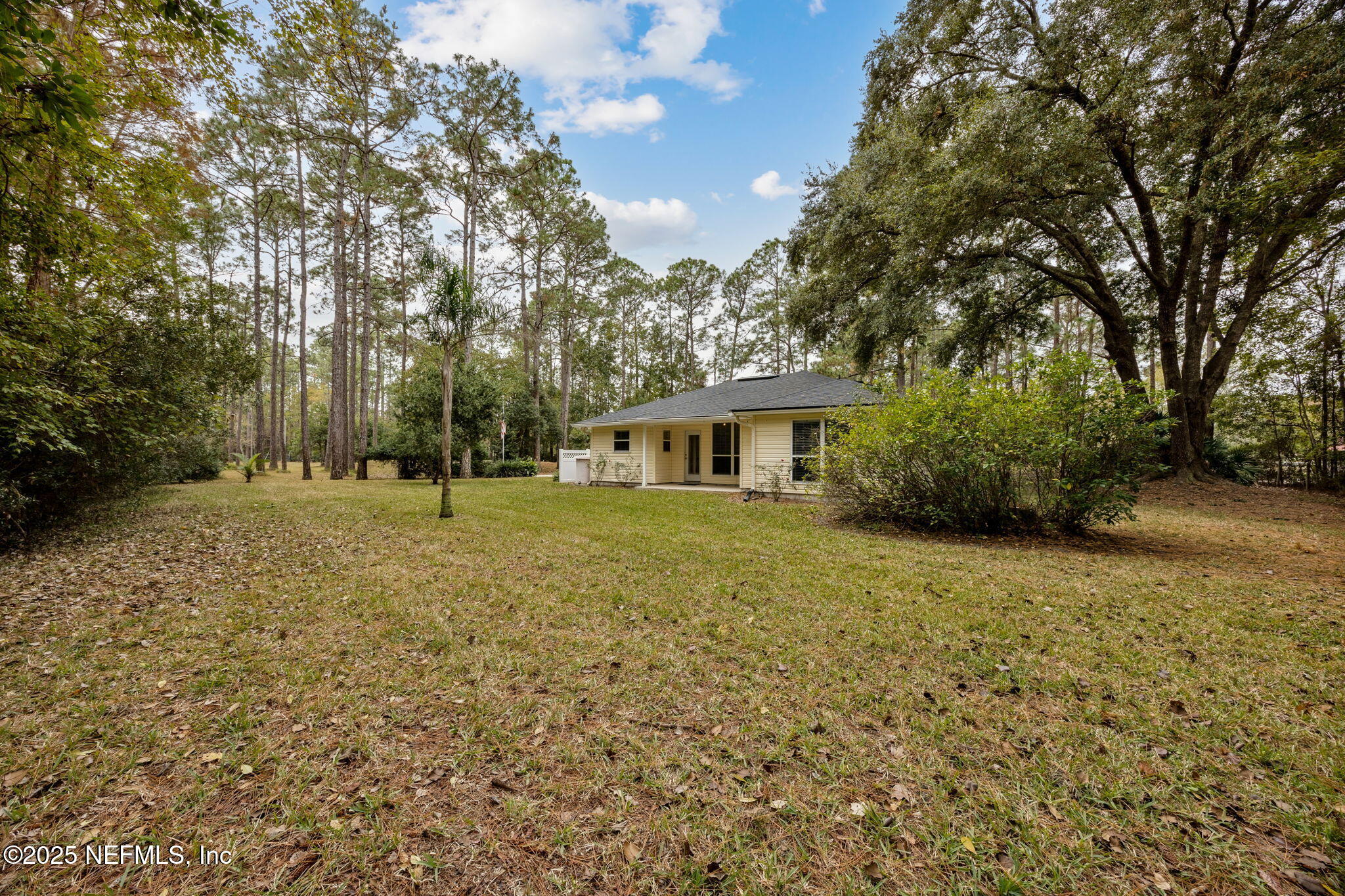 13193 Caldwell Road Jacksonville, FL 32226 - Photo 38 of 50 a front view of house with yard and trees