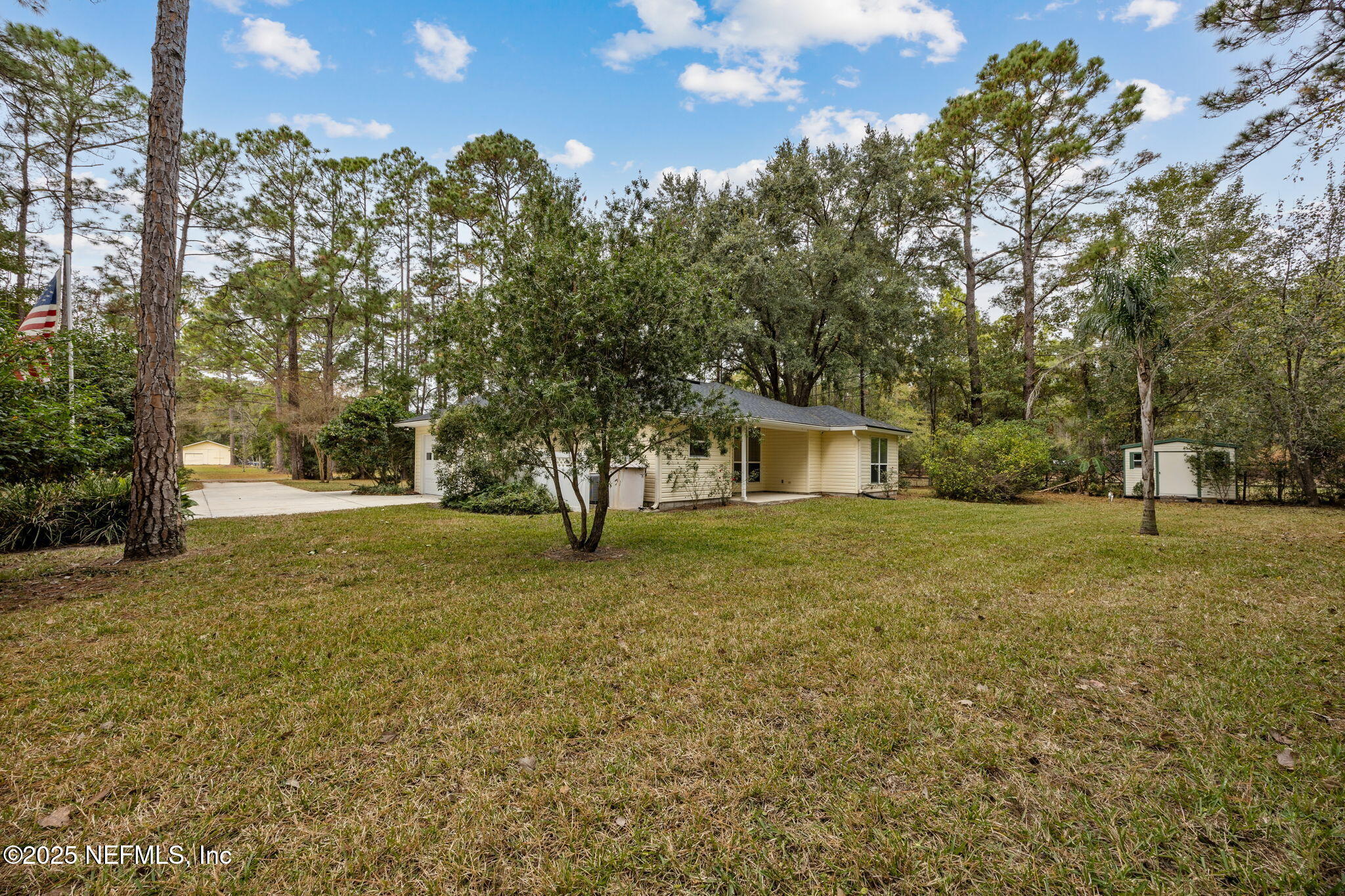 13193 Caldwell Road Jacksonville, FL 32226 - Photo 39 of 50 a view of a house with a yard