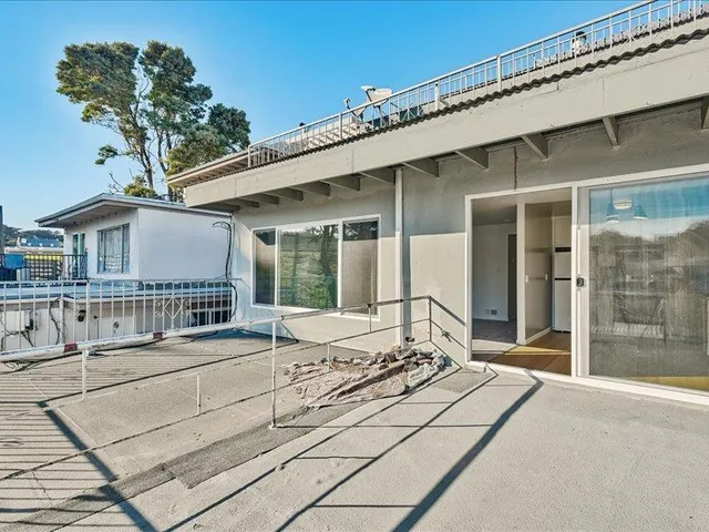 a house view with a outdoor space
