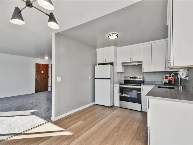 a view of center island cabinets and window