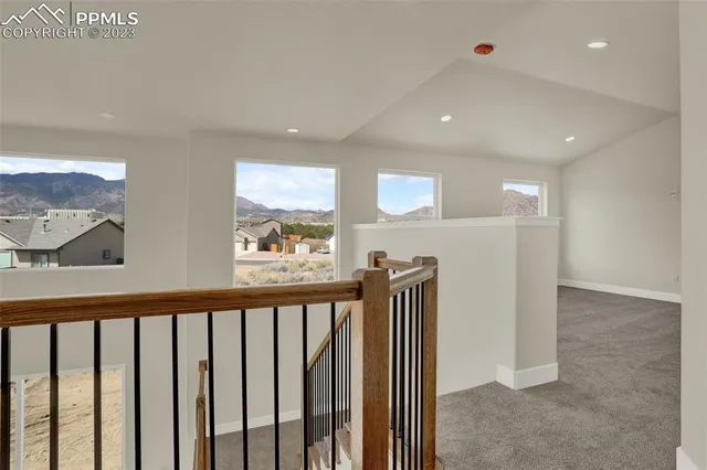 a bathroom with a granite countertop sink a toilet and a bathtub