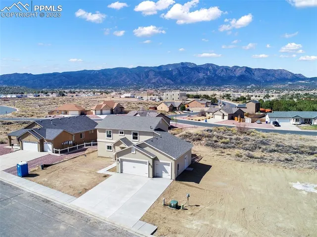 a view of a city with mountain