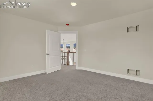 a bathroom with 2 sink and a mirror