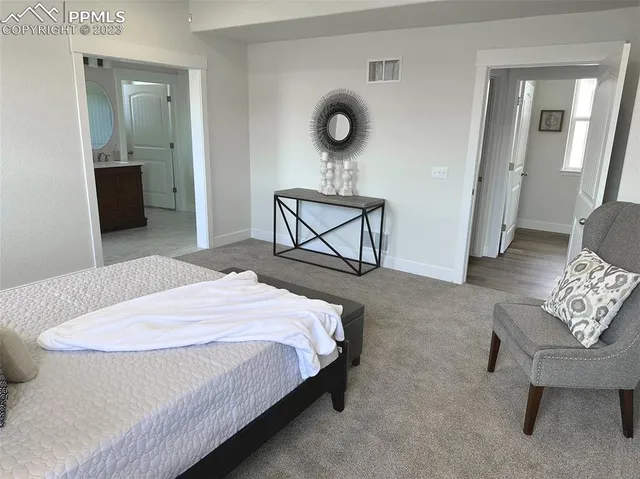 a view of an empty walk in closet