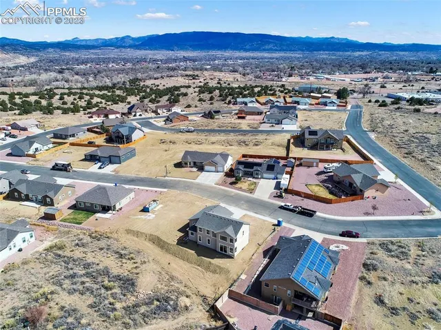 a front view of a house with a garage