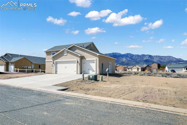 a view of staircase with lots of wooden floor and windows