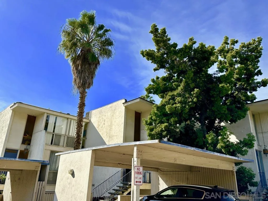 6855 Friars Road, Unit 14 San Diego, CA 92108 - Photo 1 of 31 a backyard of a house with lots of green space