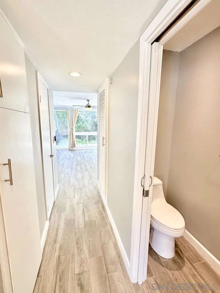 6855 Friars Road, Unit 14 San Diego, CA 92108 - Photo 22 of 31 a bathroom with a toilet and a shower