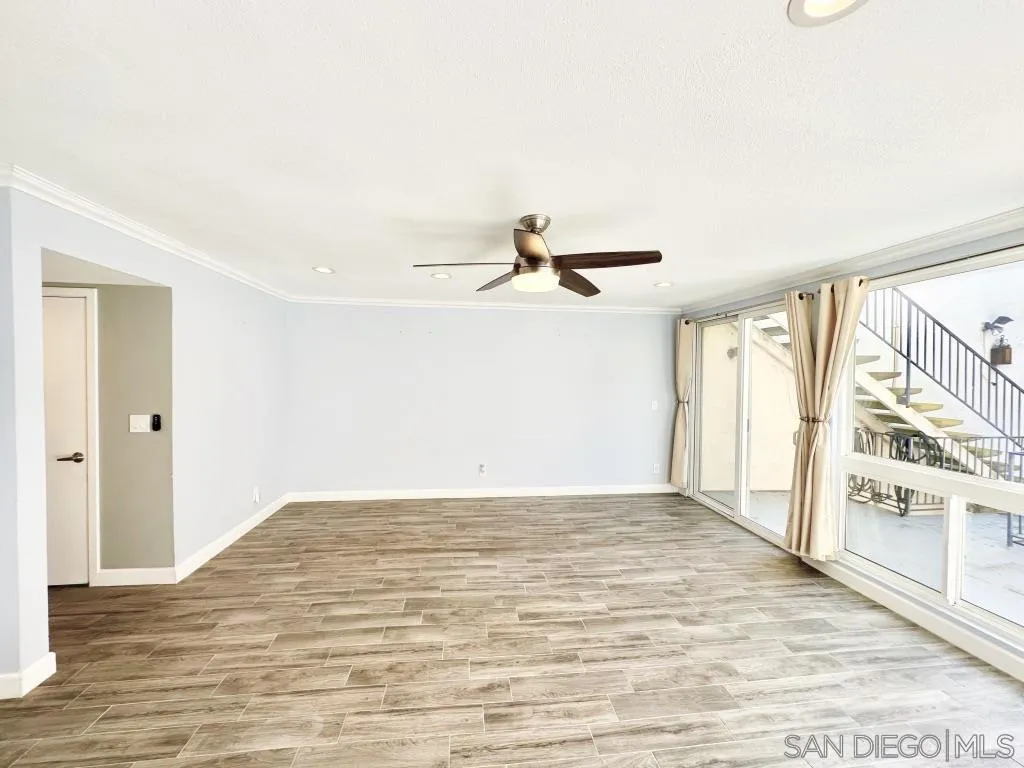 6855 Friars Road, Unit 14 San Diego, CA 92108 - Photo 26 of 31 a view of an empty room with a window
