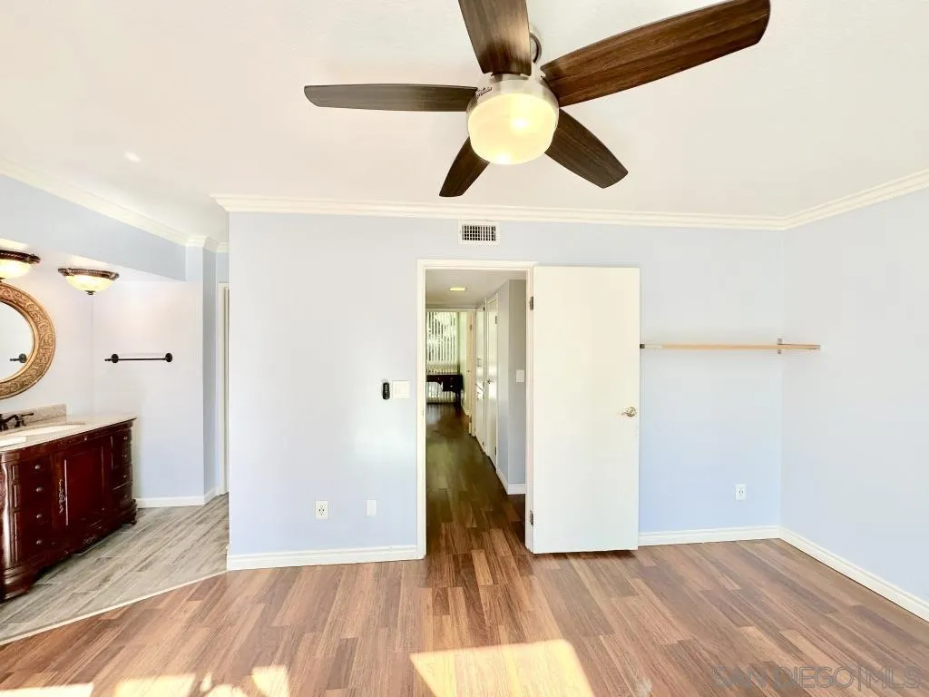 6855 Friars Road, Unit 14 San Diego, CA 92108 - Photo 8 of 31 a very nice looking room with wooden floor