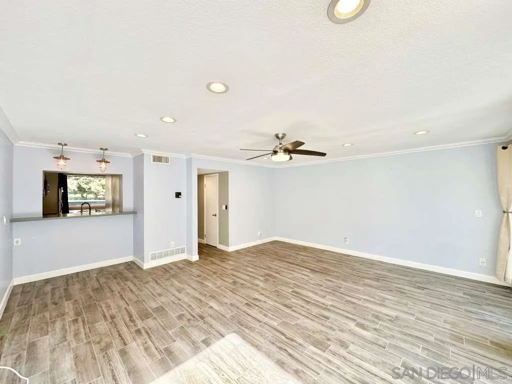 6855 Friars Road, Unit 14 San Diego, CA 92108 - Photo 9 of 31 a view of a livingroom with a fireplace