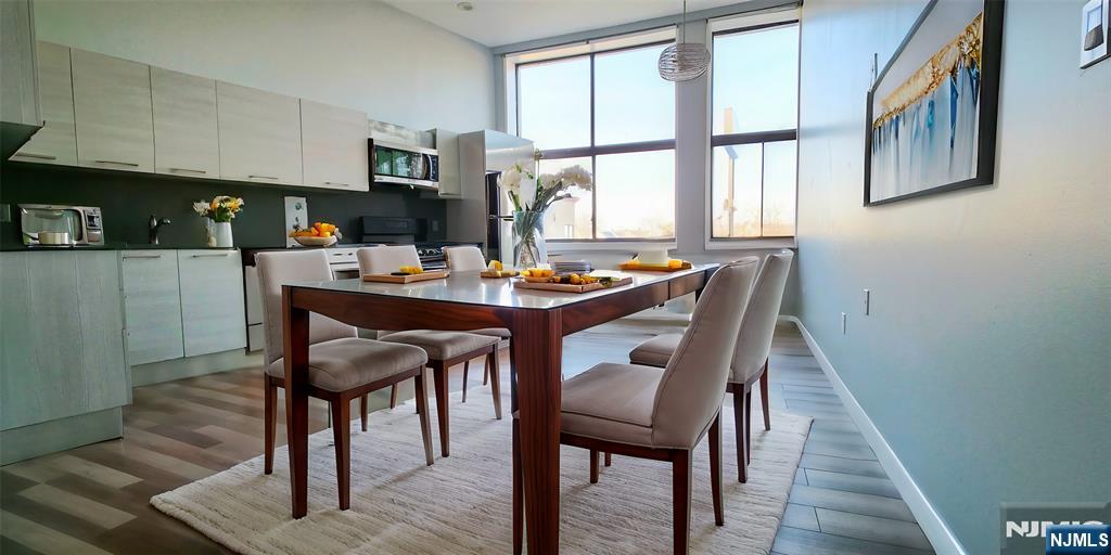 795 Main Avenue, Unit 4 Passaic, NJ 07055 - Photo 3 of 6 a dining room with furniture and window