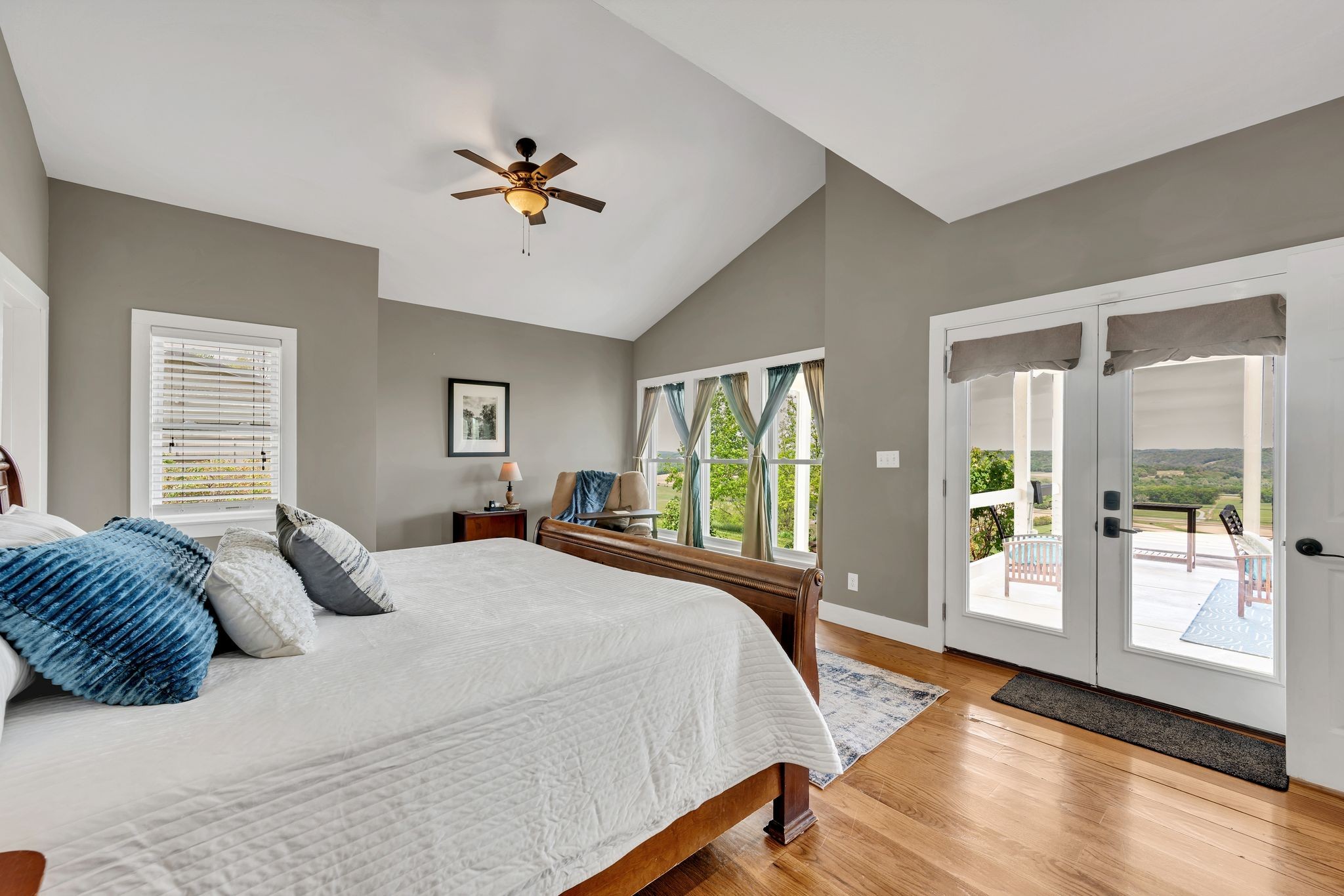 39 Fayetteville Road Kelso, TN 37348 - Photo 24 of 75 a bedroom with a large bed and a chandelier