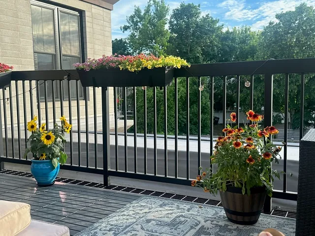 a view of a porch with furniture