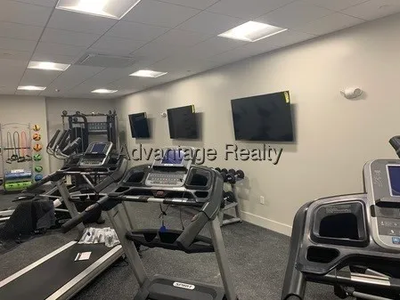 a view of a room with gym equipment
